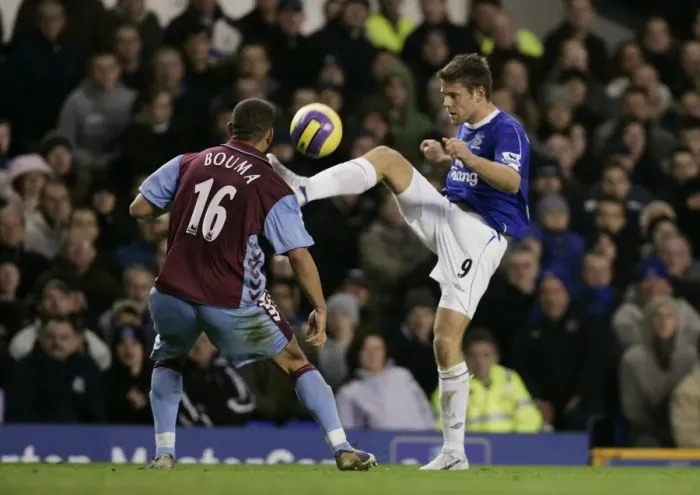 Framed Print : Clash of the Titans: Beattie vs Bouma - Everton vs Aston Villa (06 / 07) FA Premiership Showdown Framed Print : Clash of the Titans: Beattie vs Bouma - Everton vs Aston Villa (06 / 07) FA Premiership Showdown