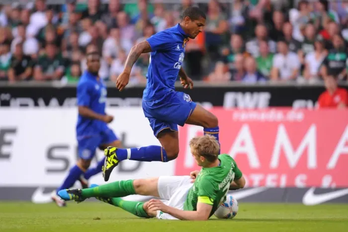 Framed Print : Clash of Titans: Per Mertesacker vs. Jermaine Beckford in the 2011 Werder Bremen vs. Everton Pre-Season Friendly Framed Print : Clash of Titans: Per Mertesacker vs. Jermaine Beckford in the 2011 Werder Bremen vs. Everton Pre-Season Friendly