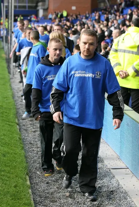 Framed Print : Community Unity at Goodison Park: Everton Volunteers and Staff Join Forces with Stoke City During Barclays Premier League Match (30 October 2010)