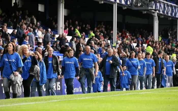 Framed Print : Community Unity at Goodison Park: Everton FC Volunteers and Staff Gather at Half-Time vs Stoke City (30 October 2010) Framed Print : Community Unity at Goodison Park: Everton FC Volunteers and Staff Gather at Half-Time vs Stoke City (30 October 2010)
