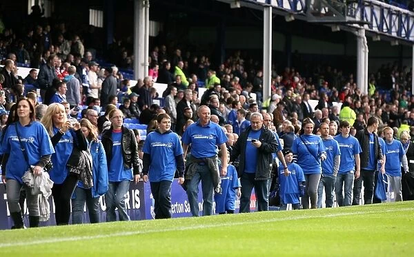 Community Unity at Goodison Park: Everton FC Volunteers and Staff Gather at Half-Time vs Stoke City (30 October 2010)