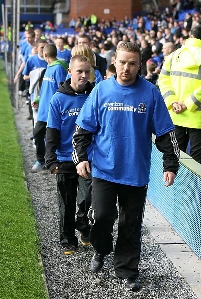 Community Unity at Goodison Park: Everton Volunteers and Staff Join Forces with Stoke City During Barclays Premier League Match (30 October 2010)
