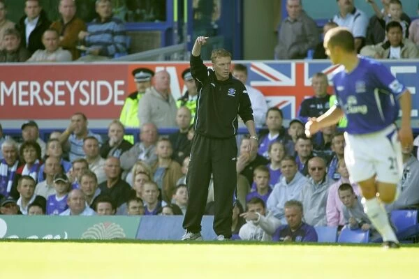 David Moyes. Moyes gives his instructions from the touchline