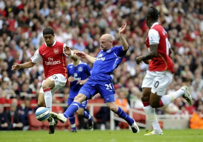 Framed Print : Denilson vs. Carsley: Intense Rivalry in the Arsenal vs. Everton Premier League Clash at Emirates Stadium (April 5, 2008)