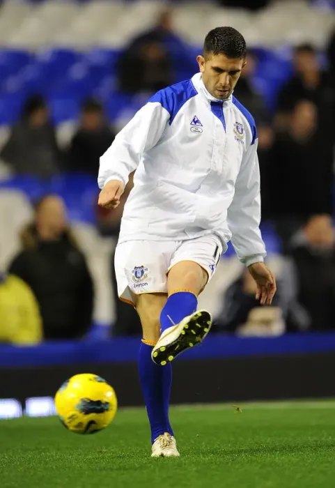 Framed Print : Denis Stracqualursi Scores the Winning Goal for Everton Against Swansea City in the Barclays Premier League at Goodison Park (21 December 2011)