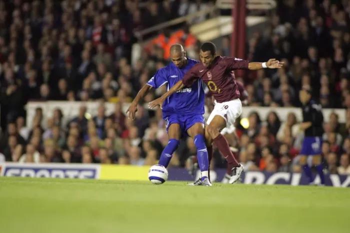 Framed Print : Determination on the Field: Marcus Bent vs. Gilberto Silva - A Football Showdown Framed Print : Determination on the Field: Marcus Bent vs. Gilberto Silva - A Football Showdown