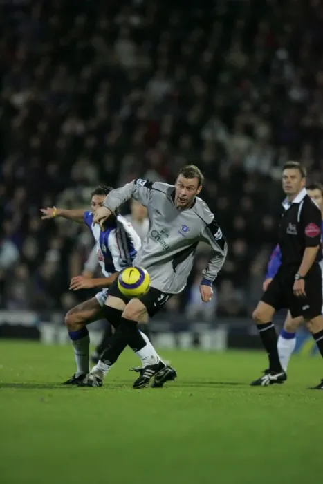 Framed Print : Determined Duncan Ferguson: Defying the Defender Framed Print : Determined Duncan Ferguson: Defying the Defender