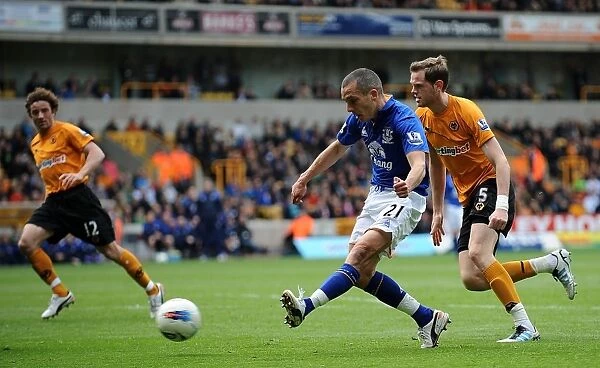Determined Moment: Leon Osman's Shot for Everton at Molineux Stadium (06 May 2012, Barclays Premier League)