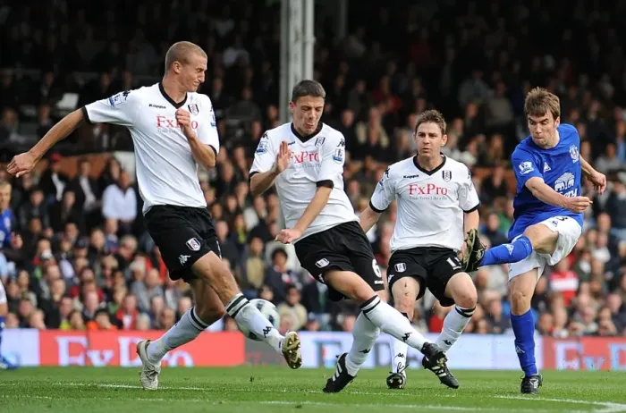 Framed Print : Determined Moment: Seamus Coleman's Striker Under Pressure for Everton Against Fulham (2010, Barclays Premier League, Craven Cottage) Framed Print : Determined Moment: Seamus Coleman's Striker Under Pressure for Everton Against Fulham (2010, Barclays Premier League, Craven Cottage)