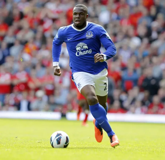 Framed Print : Determined Standoff: Anichebe's Battle at Anfield in the Premier League Rivalry (0-0, May 5, 2013)