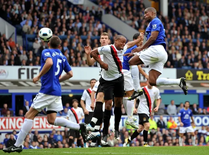 Framed Print : Distin Strikes First: Everton's Winning Goal vs Manchester City (07 May 2011, Goodison Park) Framed Print : Distin Strikes First: Everton's Winning Goal vs Manchester City (07 May 2011, Goodison Park)