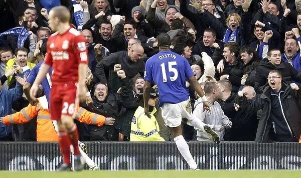 Distin's Strike: Everton's Thrilling Opener Against Liverpool at Anfield (January 16, 2011, Barclays Premier League)