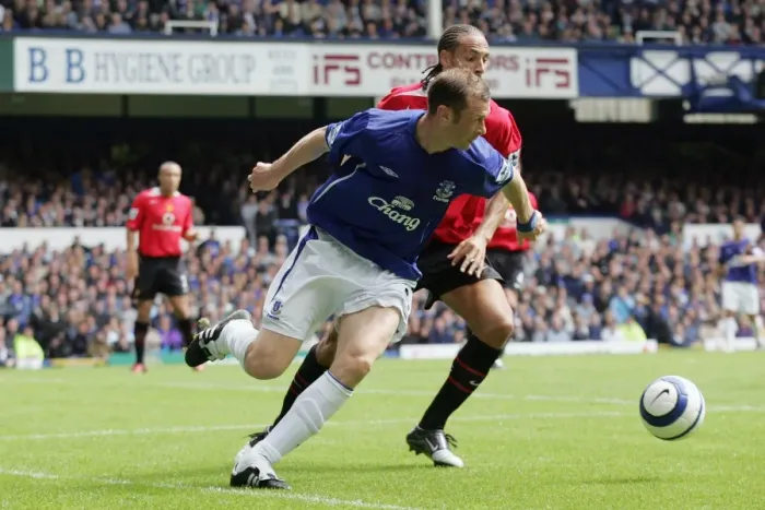 Framed Print : Duncan Ferguson vs. Rio Ferdinand: A Football Rivalry Unfolds in Everton's Season Opener Framed Print : Duncan Ferguson vs. Rio Ferdinand: A Football Rivalry Unfolds in Everton's Season Opener