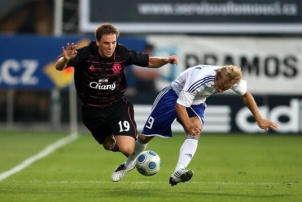 Europa League Battle: Gosling vs. Otepka - Everton vs. Sigma Olomouc: A Clash of Midfield Titans