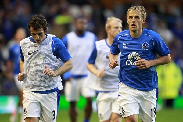 Everton FC: Baines and Neville in Focus during Pre-Match Training before Capital One Cup Clash vs. Leyton Orient (Goodison Park, 29-08-2012)