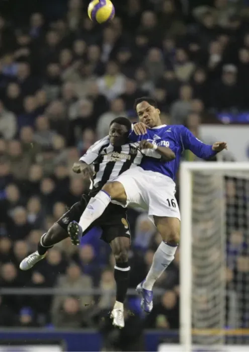 Framed Print : Everton FC: Lescott and Obafemi in Action Against Newcastle United Framed Print : Everton FC: Lescott and Obafemi in Action Against Newcastle United