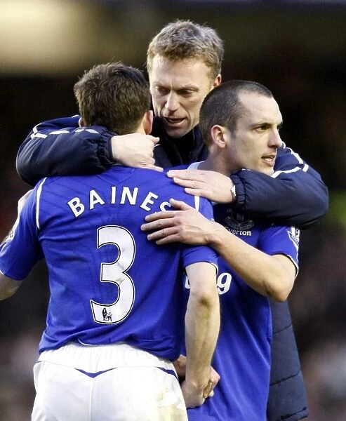 Everton FC: Moyes and Players Celebrate FA Cup Quarter Final Victory over Middlesbrough - Triumphant Moment with Leighton Baines and Leon Osman (08 / 09)