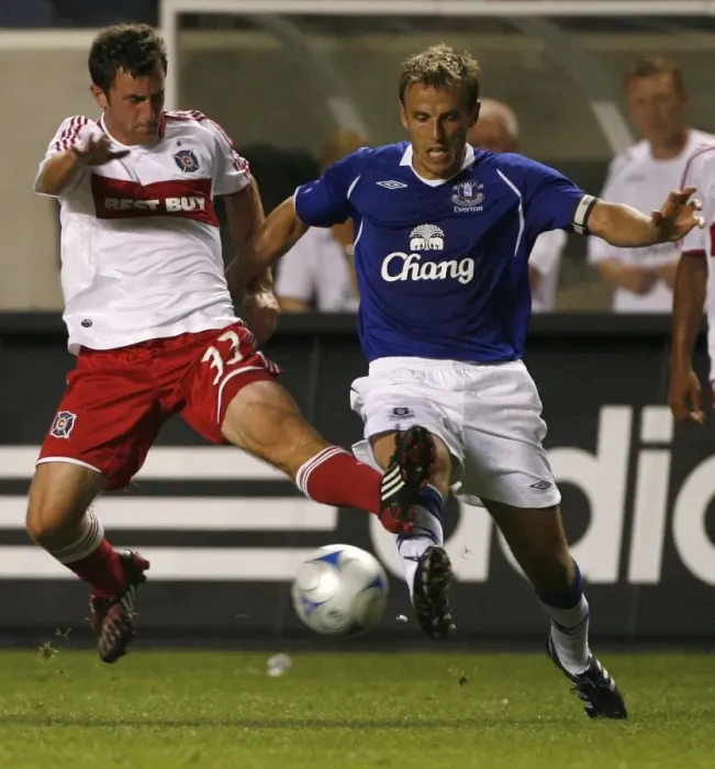 Framed Print : Everton FC Phil Neville struggles with Chicago Fire Stephen King In Bridgeview I Framed Print : Everton FC Phil Neville struggles with Chicago Fire Stephen King In Bridgeview I