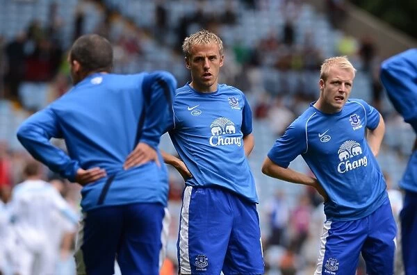 Everton FC: Phil Neville and Teammates Stretching During Warm-Up at Villa Park before Aston Villa vs Everton (25-08-2012)
