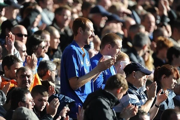 Everton FC: A Sea of Passionate Fans Roaring for Victory - Everton vs Wigan Athletic (September 17, 2011), Goodison Park