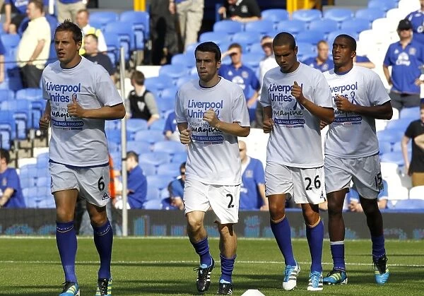 Everton FC vs Liverpool: Pre-Game Warm-Up at Goodison Park - Everton Players Gear Up for the Barclays Premier League Showdown (01 October 2011)
