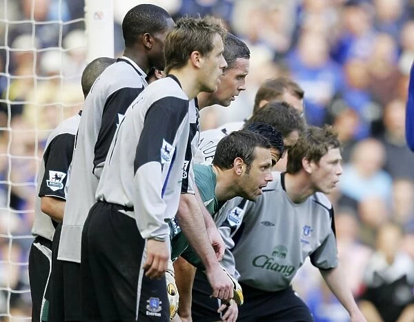 Everton Team. The entire Everton team line up on the goal line to defend
