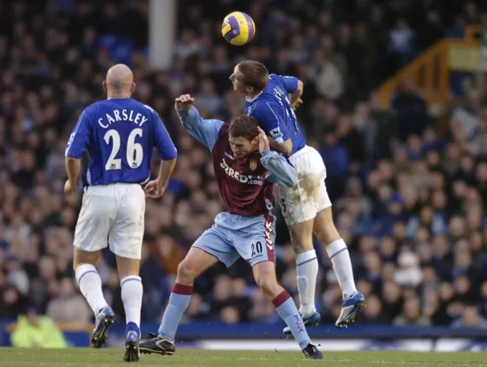 Framed Print : Everton v Aston Villa Alan Stubbs and Chris Sutton - Aston Villa battle for the ball Framed Print : Everton v Aston Villa Alan Stubbs and Chris Sutton - Aston Villa battle for the ball