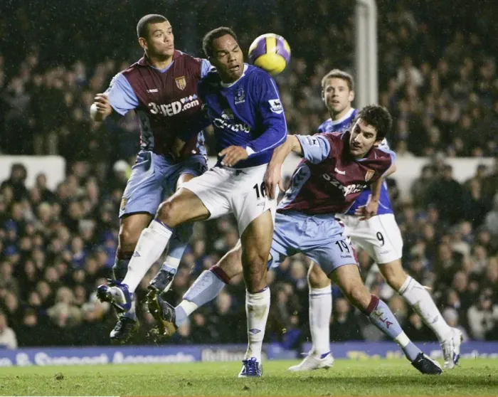Framed Print : Everton v Aston Villa Joleon Lescott in action with Aston Villas Wilfred Bouma Framed Print : Everton v Aston Villa Joleon Lescott in action with Aston Villas Wilfred Bouma