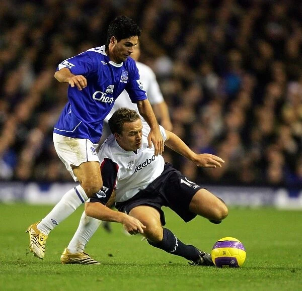 Everton v Bolton - Evertons Mikel Arteta and Boltons Kevin Davies in action