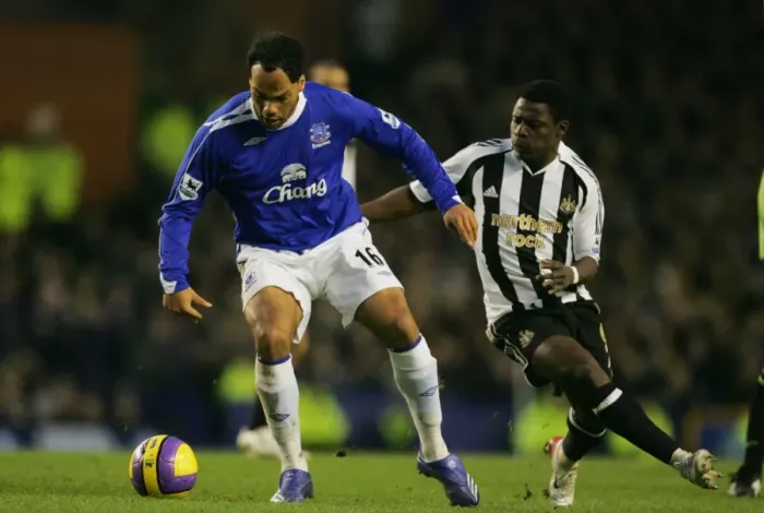 Framed Print : Everton v Newcastle United Joleon Lescott and Obafemi Martins in action Framed Print : Everton v Newcastle United Joleon Lescott and Obafemi Martins in action
