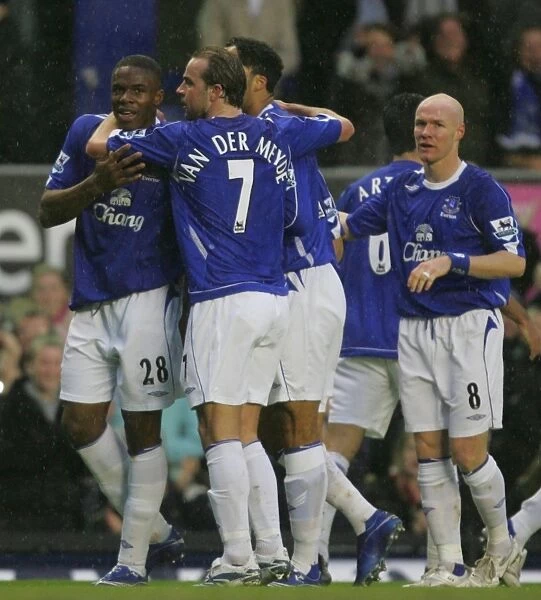 Everton v Newcastle United Victor Anichebe celebrates after scoring with Andy Van der Meyde