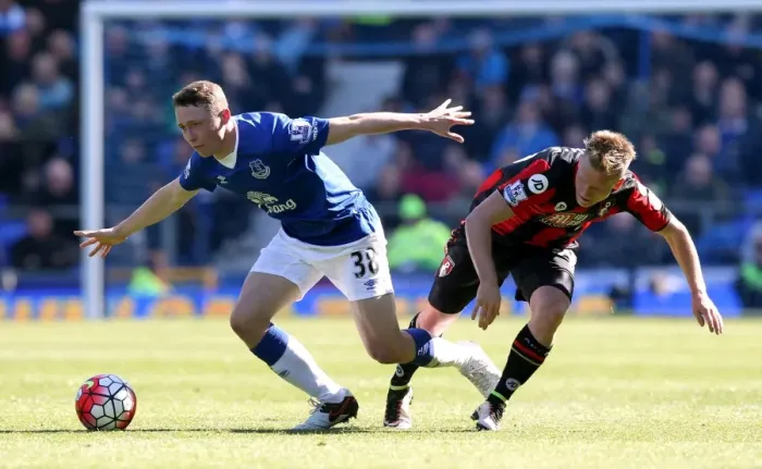 Framed Print : Everton vs. AFC Bournemouth: Pennington vs. Ritchie in Intense Battle at Goodison Park