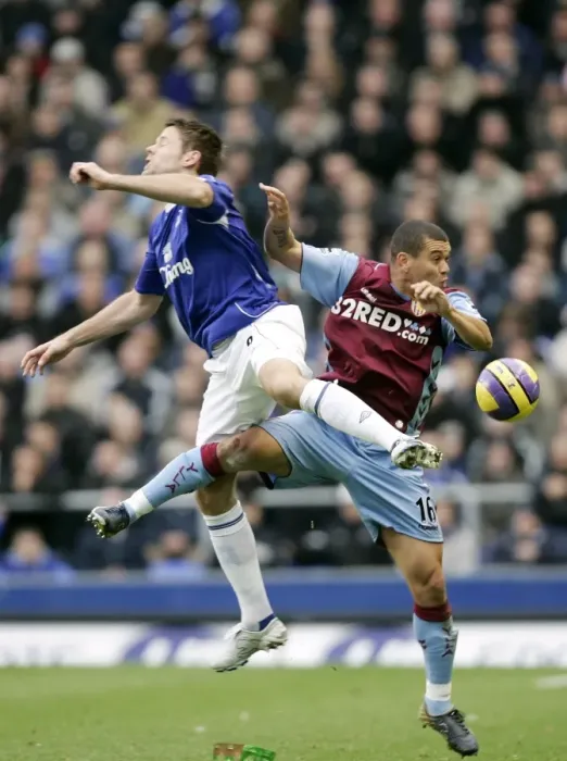 Framed Print : Everton vs. Aston Villa: James Beattie vs. Wilfred Bouma - Football Rivalry Framed Print : Everton vs. Aston Villa: James Beattie vs. Wilfred Bouma - Football Rivalry