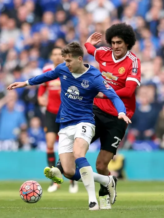 Framed Print : Everton vs Manchester United: A Battle for the FA Cup Semi-Final Ball - Fellaini vs Stones at Wembley Stadium