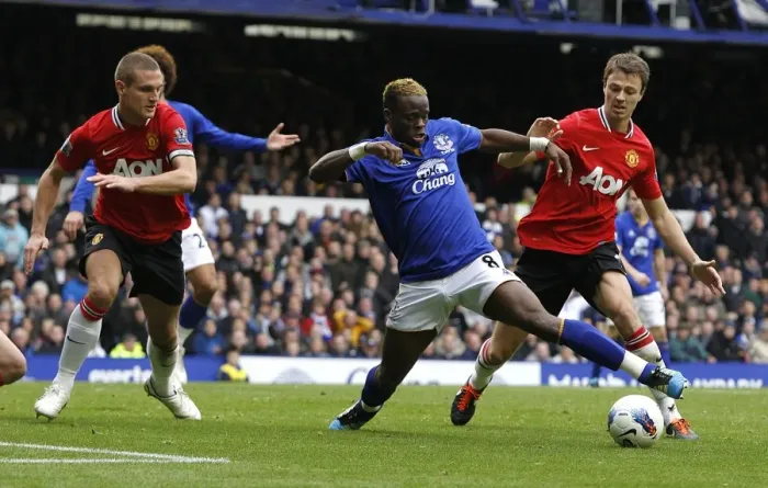 Framed Print : Everton vs Manchester United: A Premier League Battle - Evans vs Saha Showdown