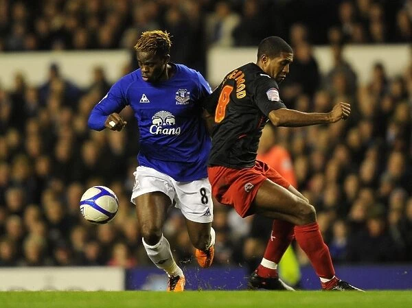 Everton vs Reading FA Cup Clash: Saha vs Leigertwood's Intense Battle for Ball Possession (5th Round, Goodison Park, 01 March 2011)