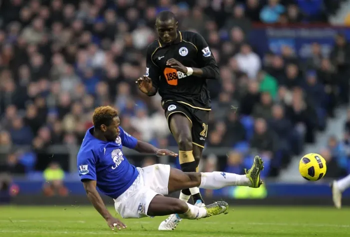 Framed Print : Everton vs Wigan Athletic: A Battle at Goodison Park - Louis Saha vs Mohamed Diame: Clash of the Midfield Titans Framed Print : Everton vs Wigan Athletic: A Battle at Goodison Park - Louis Saha vs Mohamed Diame: Clash of the Midfield Titans