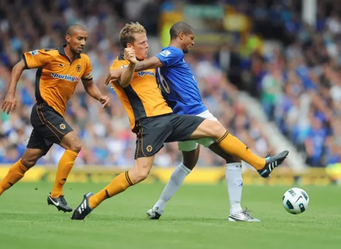 Framed Print : Everton vs. Wolverhampton Wanderers: A Tight Battle at Goodison Park - Jermaine Beckford vs. Christophe Berra: Intense Rivalry on the Field Framed Print : Everton vs. Wolverhampton Wanderers: A Tight Battle at Goodison Park - Jermaine Beckford vs. Christophe Berra: Intense Rivalry on the Field