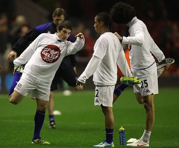 Everton's Baines, Pienaar, and Fellaini Unite in Focus during Liverpool's Anfield Warm-Up (13 March 2012)