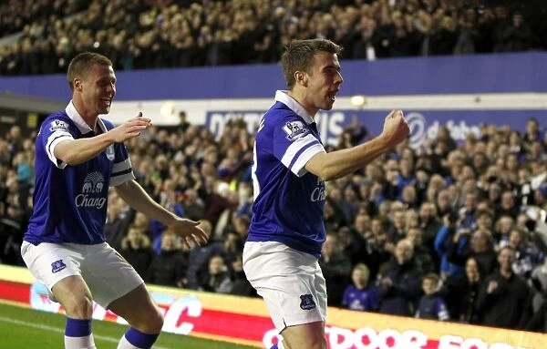 Everton's Coleman and McCarthy: A Dynamic Duo Celebrates Their Second Goal Against Stoke City (4-0)