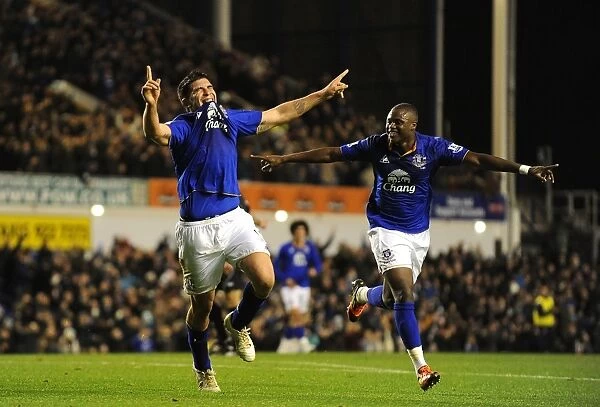 Everton's Denis Stracqualursi and Magaye Gueye Celebrate First Goal in FA Cup Fourth Round Match Against Fulham