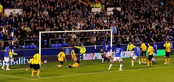 Everton's Europa League Triumph: Sylvain Distin Scores the Decisive Goal Against AEK Athens at Goodison Park