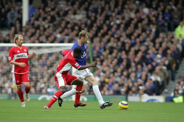 Framed Print : Everton's Ferguson Shields the Ball from Boateng: A Football Intense Moment Framed Print : Everton's Ferguson Shields the Ball from Boateng: A Football Intense Moment