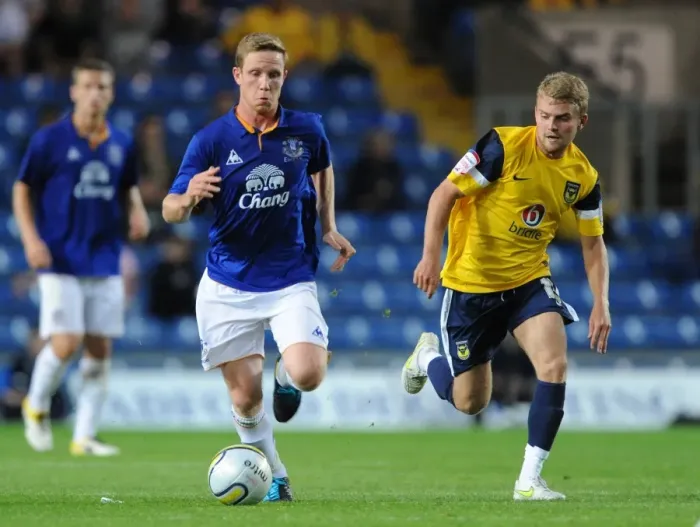 Framed Print : Everton's Forshaw vs. Potter: A Pre-Season Battle at Kassam Stadium (2011) Framed Print : Everton's Forshaw vs. Potter: A Pre-Season Battle at Kassam Stadium (2011)