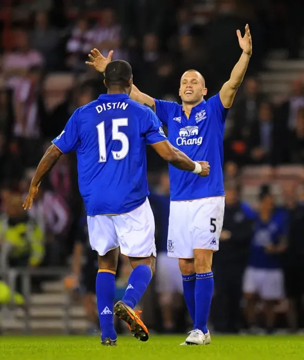 Framed Print : Everton's Glory: Distin and Heitinga Celebrate FA Cup Sixth Round Replay Victory over Sunderland Framed Print : Everton's Glory: Distin and Heitinga Celebrate FA Cup Sixth Round Replay Victory over Sunderland