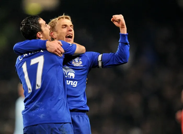 Framed Print : Everton's Glory: Tim Cahill and Phil Neville's Victory Celebration over Manchester City (2010)