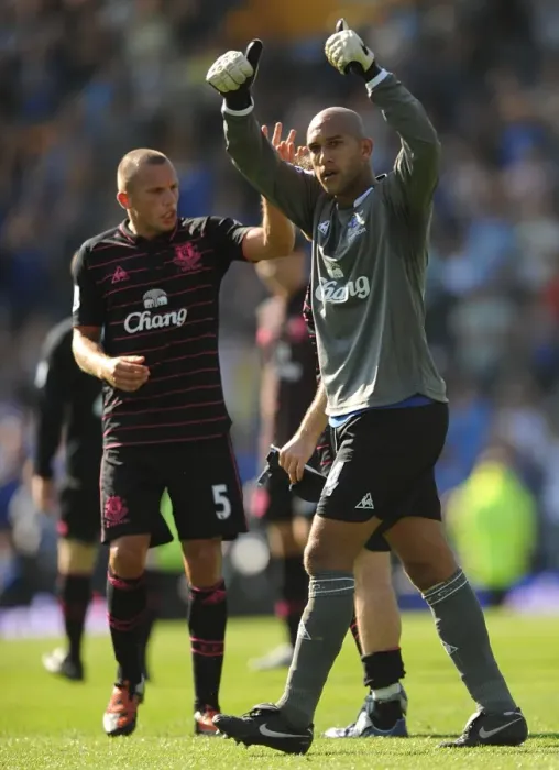 Framed Print : Everton's Heitinga and Howard: Victory Celebration at Fratton Park after Portsmouth Match Framed Print : Everton's Heitinga and Howard: Victory Celebration at Fratton Park after Portsmouth Match