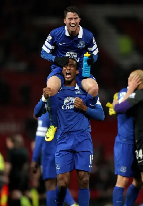 Framed Print : Everton's Historic Upset: Bryan Oviedo and Sylvain Distin Celebrate 1-0 Victory at Old Trafford (December 4, 2013, Barclays Premier League) Framed Print : Everton's Historic Upset: Bryan Oviedo and Sylvain Distin Celebrate 1-0 Victory at Old Trafford (December 4, 2013, Barclays Premier League)