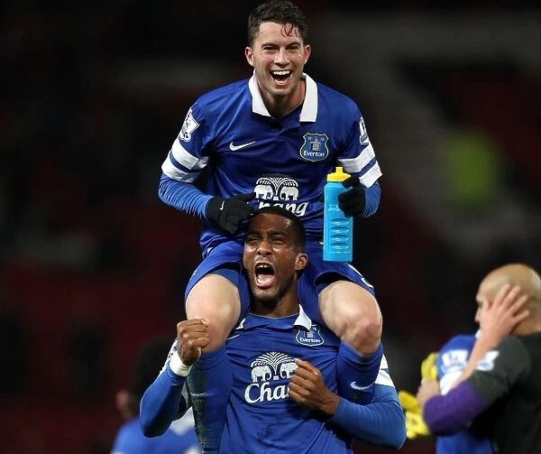 Everton's Historic Victory: Oviedo and Distin Celebrate Over Manchester United (0-1)