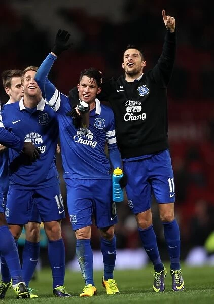 Everton's Historic Win: Bryan Oviedo and Kevin Mirallas Celebrate Over Manchester United (4-12-2013, Old Trafford : Manchester United 0 - Everton 1)